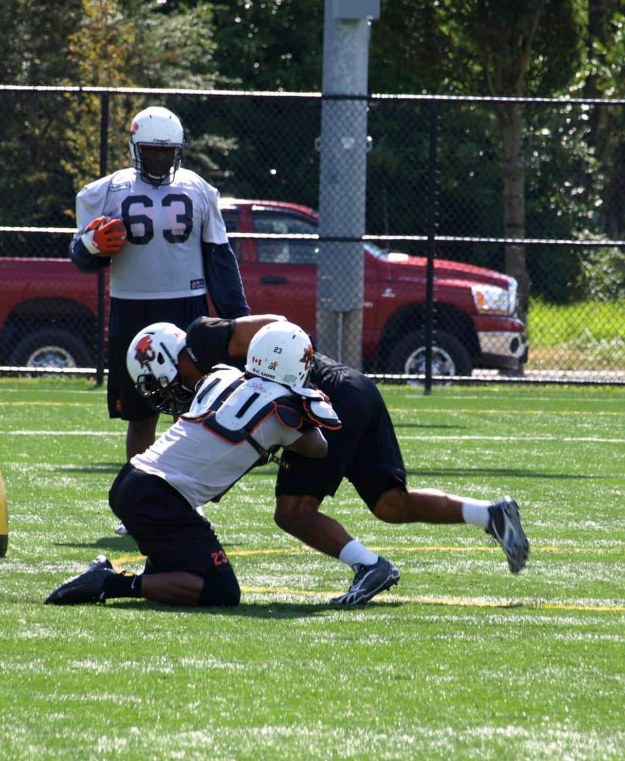 Football players colliding during match